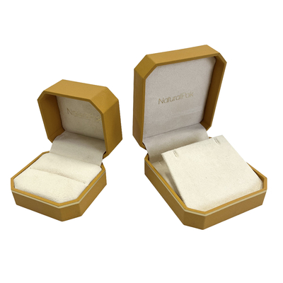 A forma do octógono personalizou a caixa de empacotamento da joia com linha do ouro